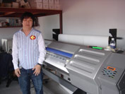 Professor Buncha Hnungsue and his SOLJET 74” printer