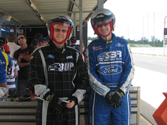 Matthew Daley (left) and Richard Miles (right) from A. Miles suiting up for a HOT LAP!